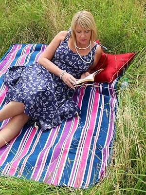 Naughty British housewife Amy fucking in an open field